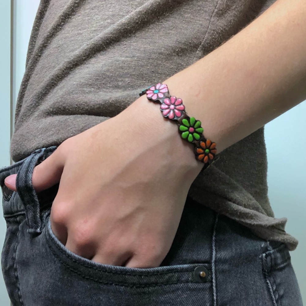 Leather flower bracelet.